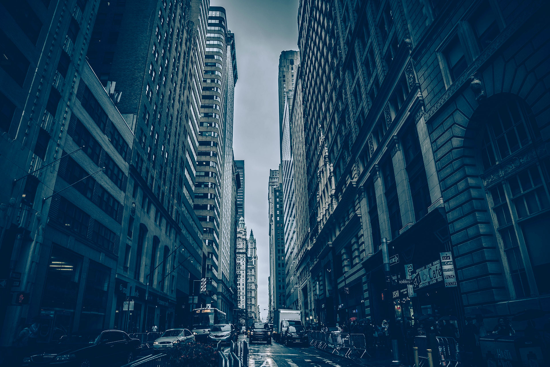 Tall buildings lining a city street.