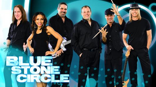 Band members posing with instruments, "Blue Stone Circle".