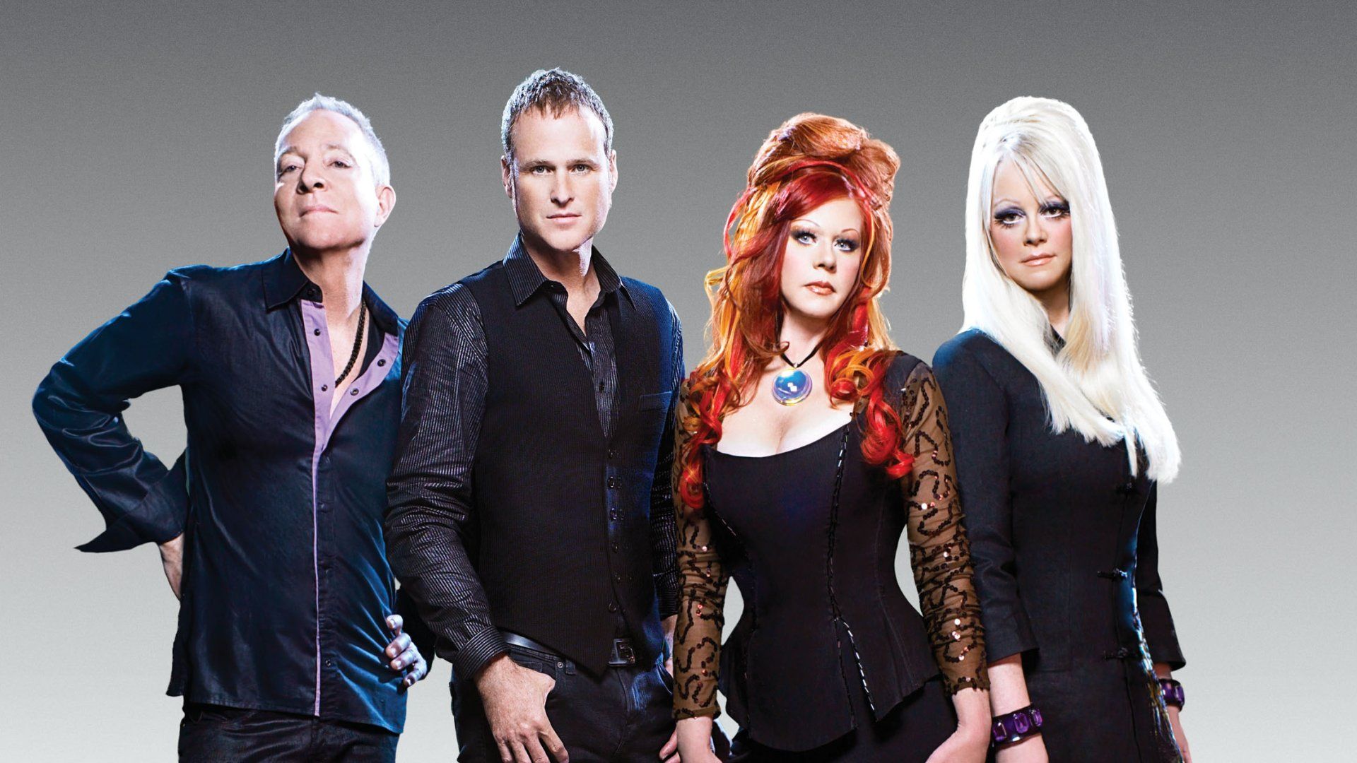 A group of people standing next to each other.