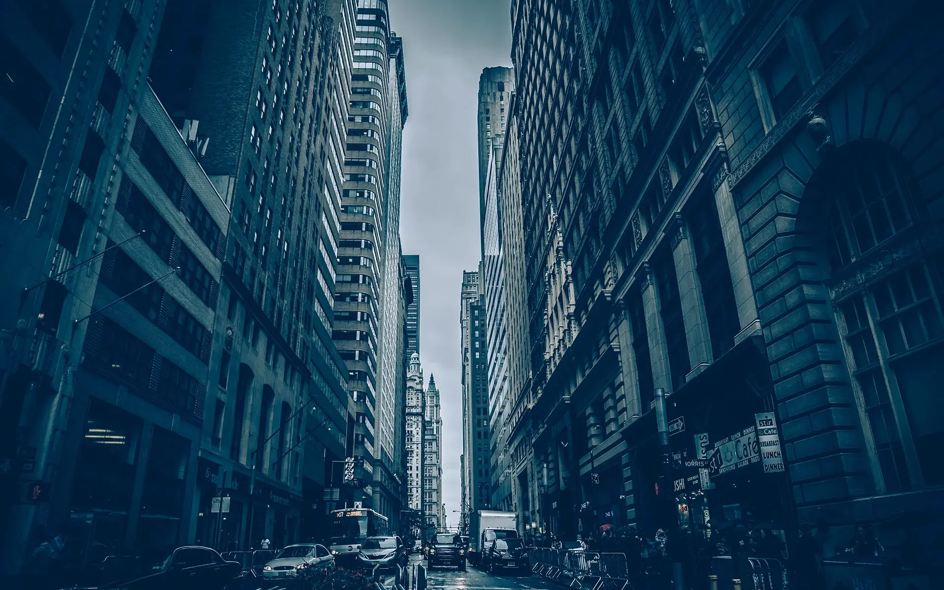 Tall buildings lining a city street.